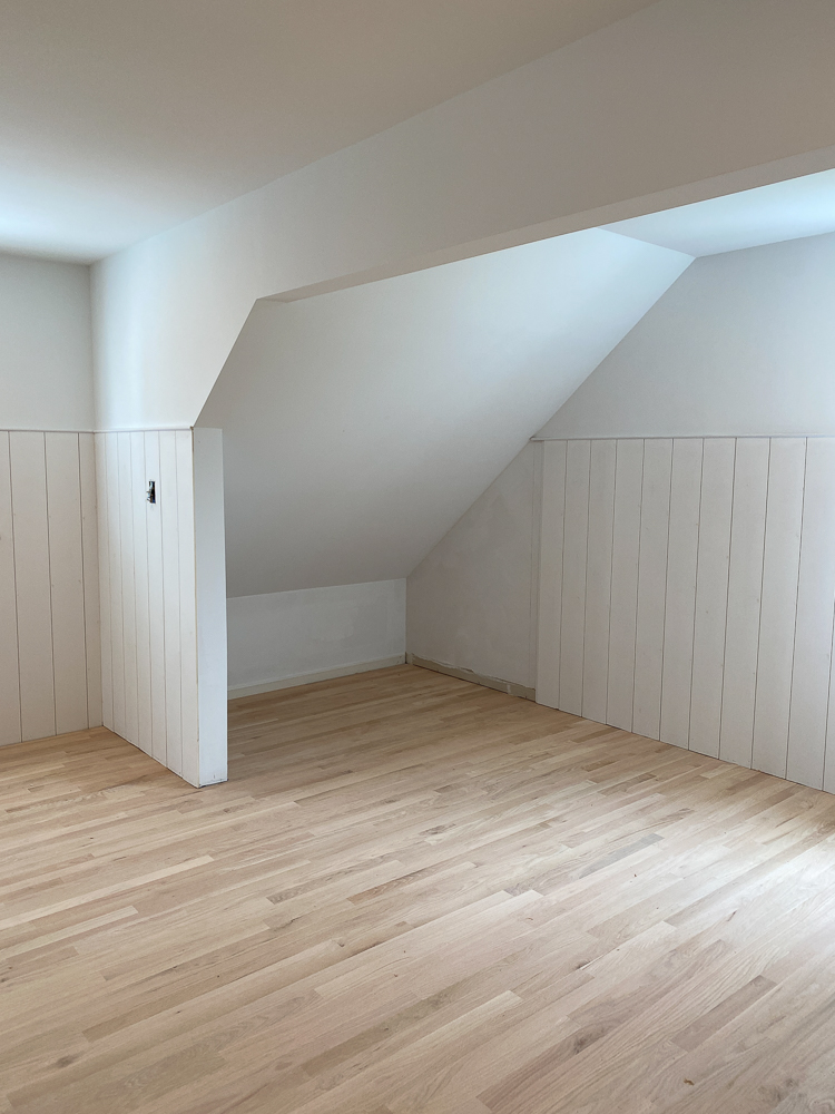 Vertical shiplap, red oak hardwood floors
