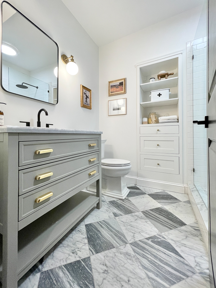 checkerboard marble floors, bathroom vanity, storage drawers and shelves