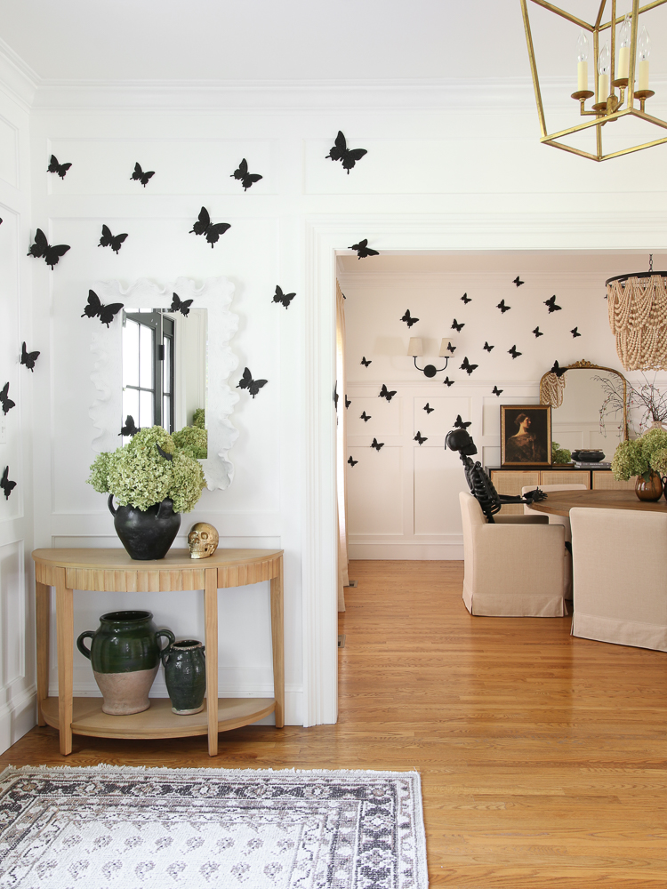 fall decor, black glitter butterflies, black front door, console table, dining room decor, black skeleton