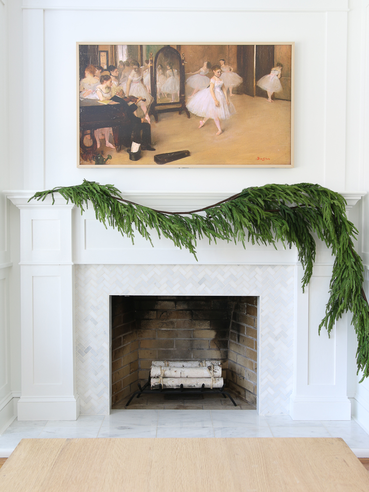 hang garland on mantel with 3 strands of garland and 1 branch
