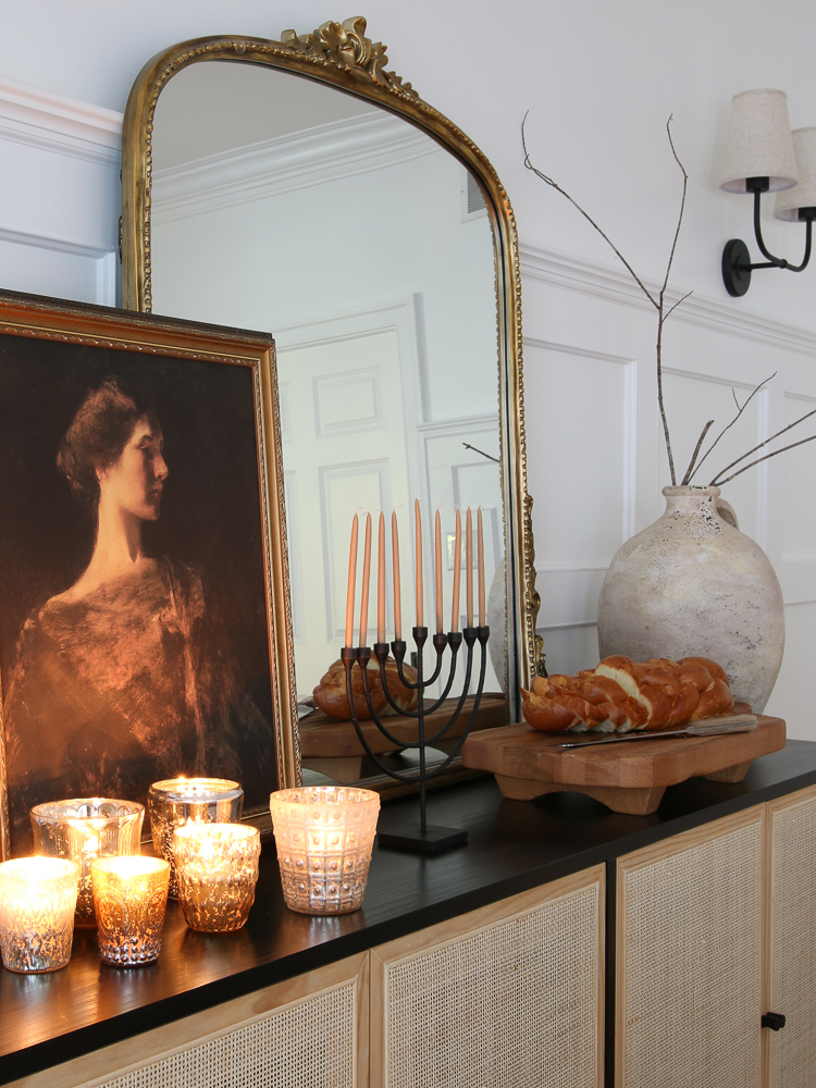 Hanukkah decor with menorah and mercury glass candle holders