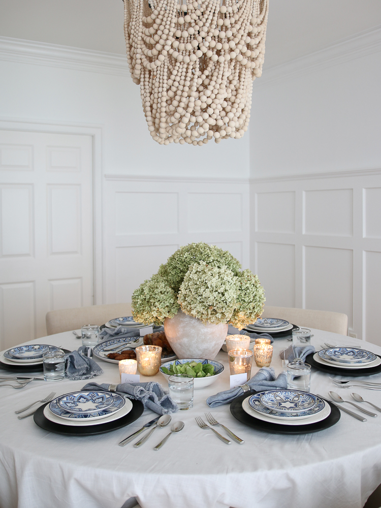 Set the Hanukkah table with classic blue, white, and silver pieces for a festive mood