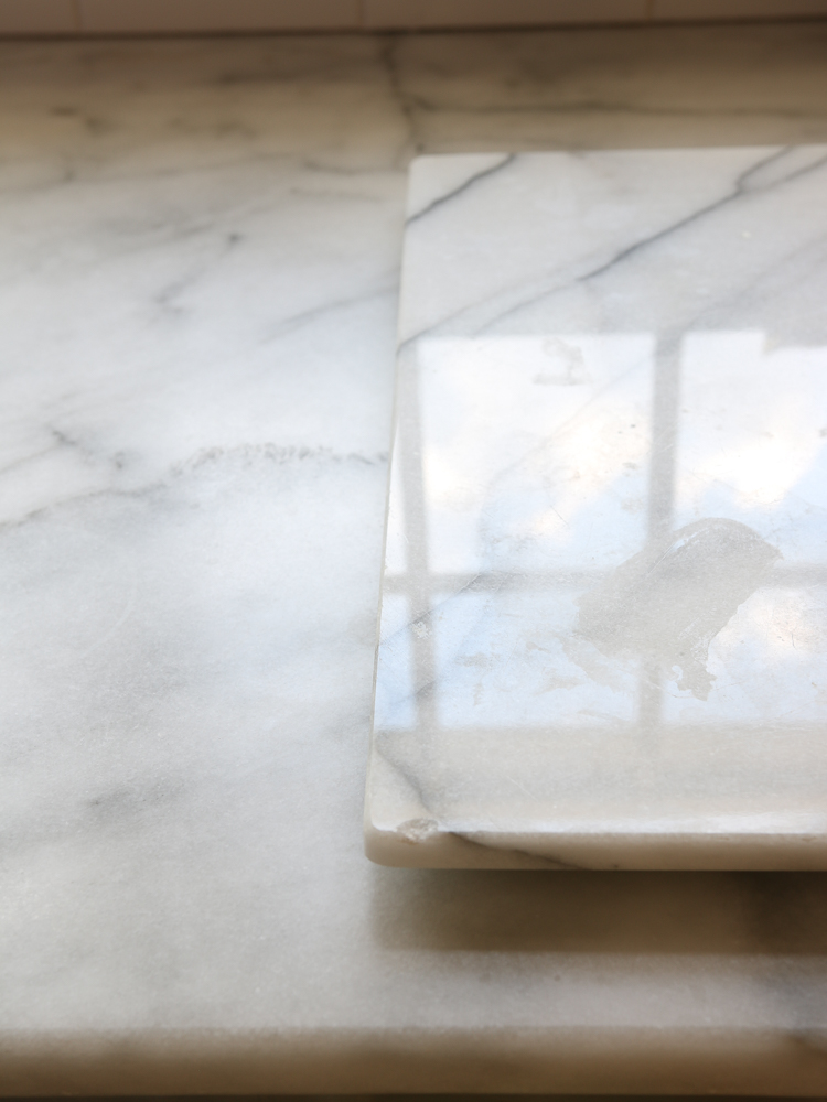 etch mark on polished marble serving board 