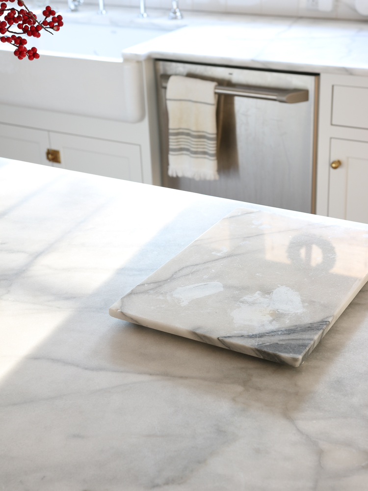 polished marble cutting board with etch marks
