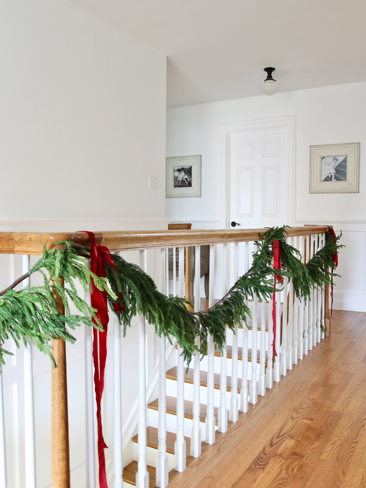 stairway banister railing, Christmas Garland, red velvet ribbon