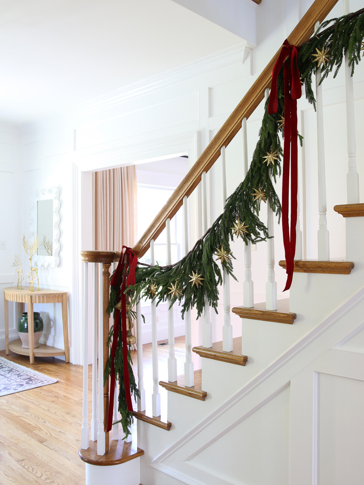 stairway with Christmas Garland, red velvet ribbon