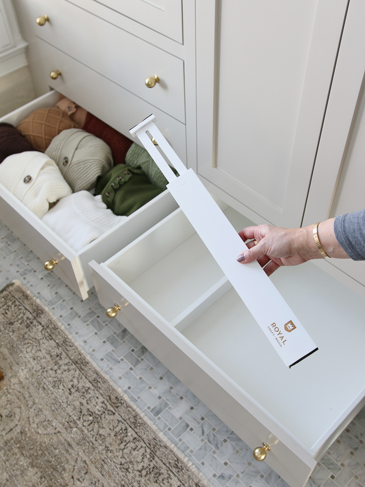 person showing expandable drawer divider
