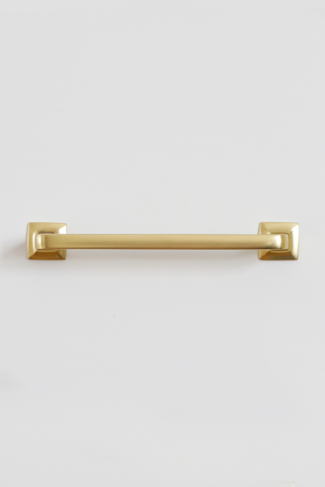 close up of brass drawer pull