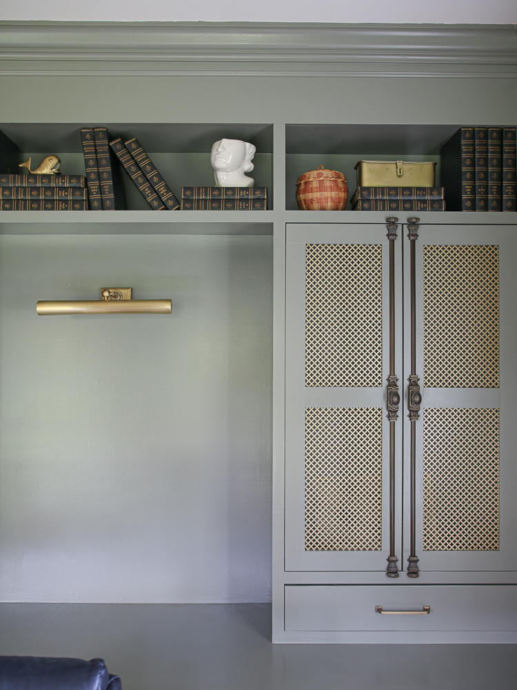 DIY built in cabinet with Cremone bolt hardware and metal mesh insert doors, picture light 
