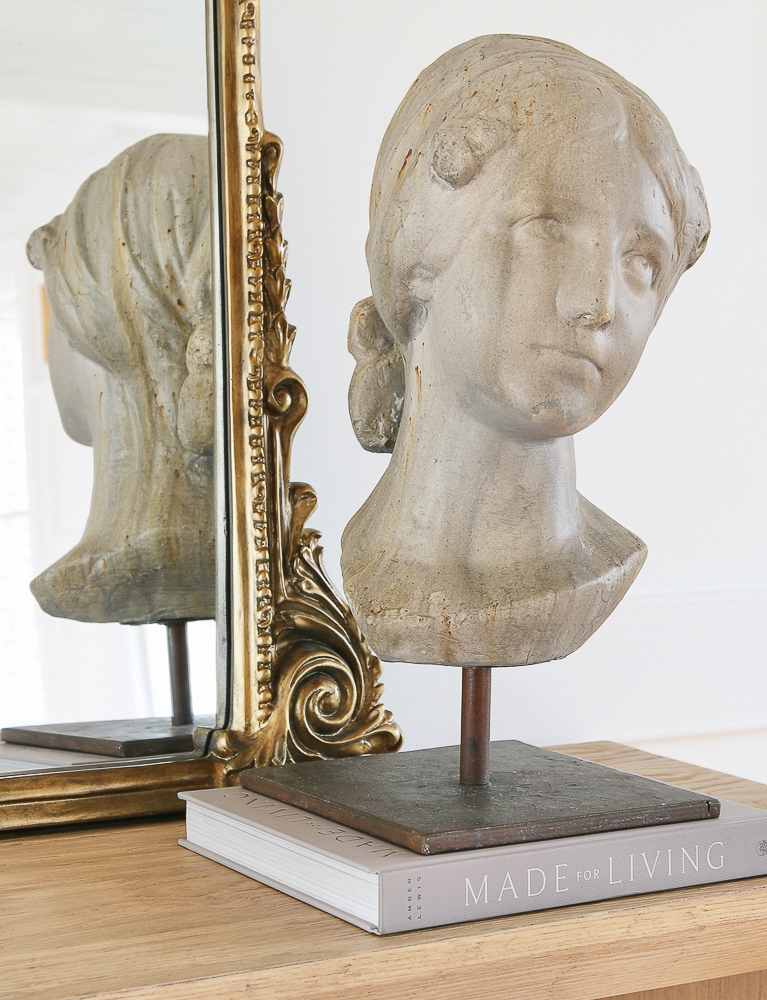 close up of female bust on metal stand, Anthropologie Gleaming Primrose mirror