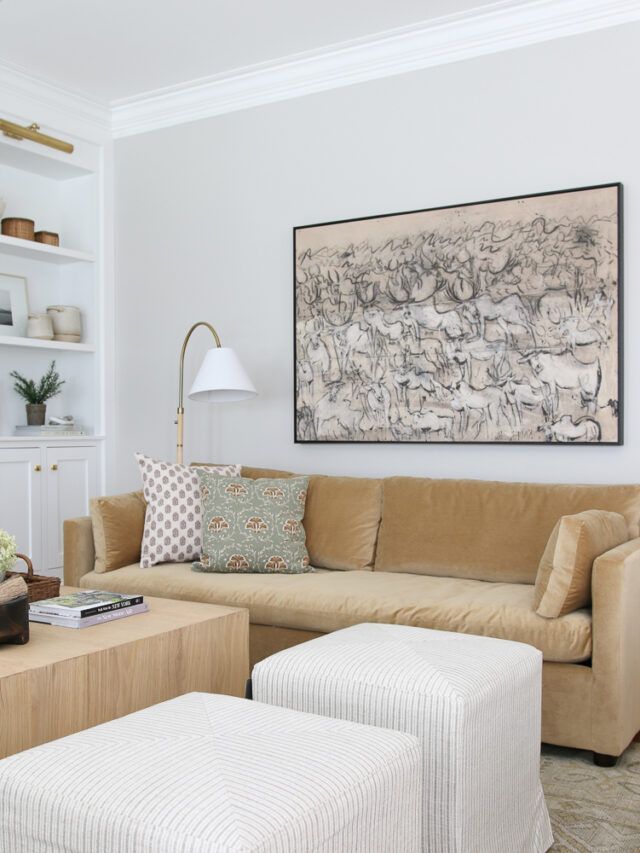 big wall in living room, large artwork over velvet Marin west elm sofa, agreeable gray wall, built-in shelves