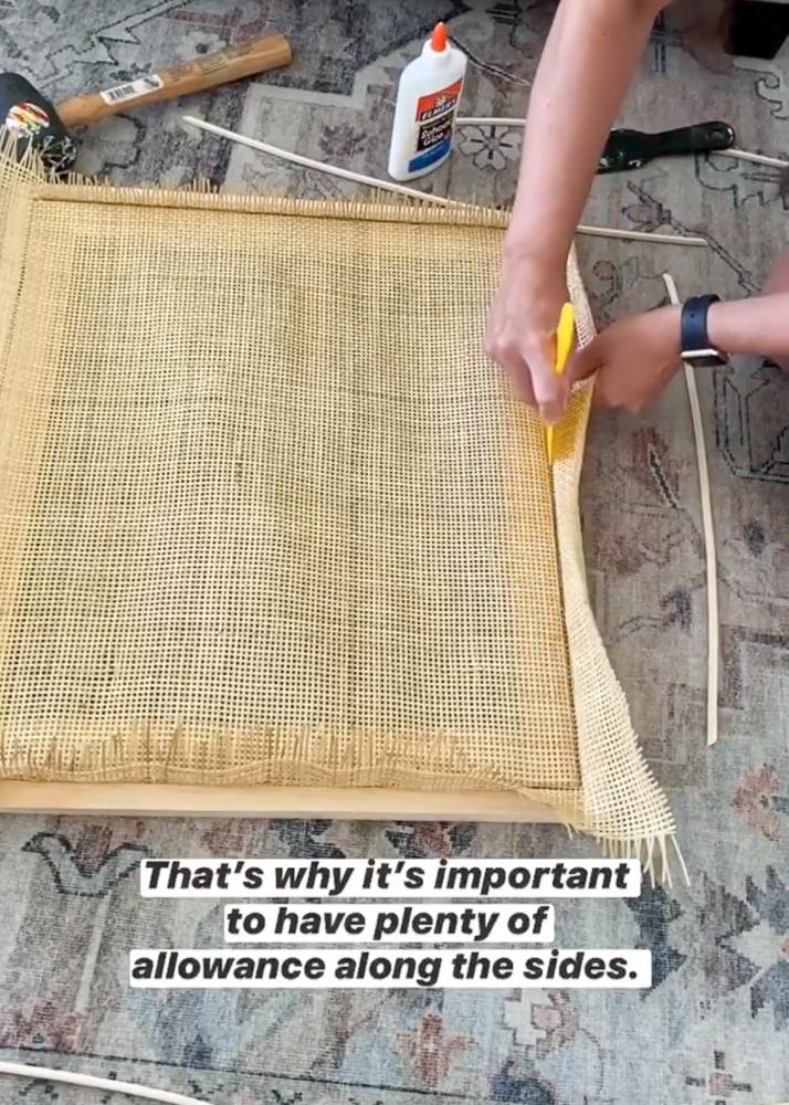 person demonstrating furniture and chair caning steps, how to use a plastic putty knife to push caning into groove