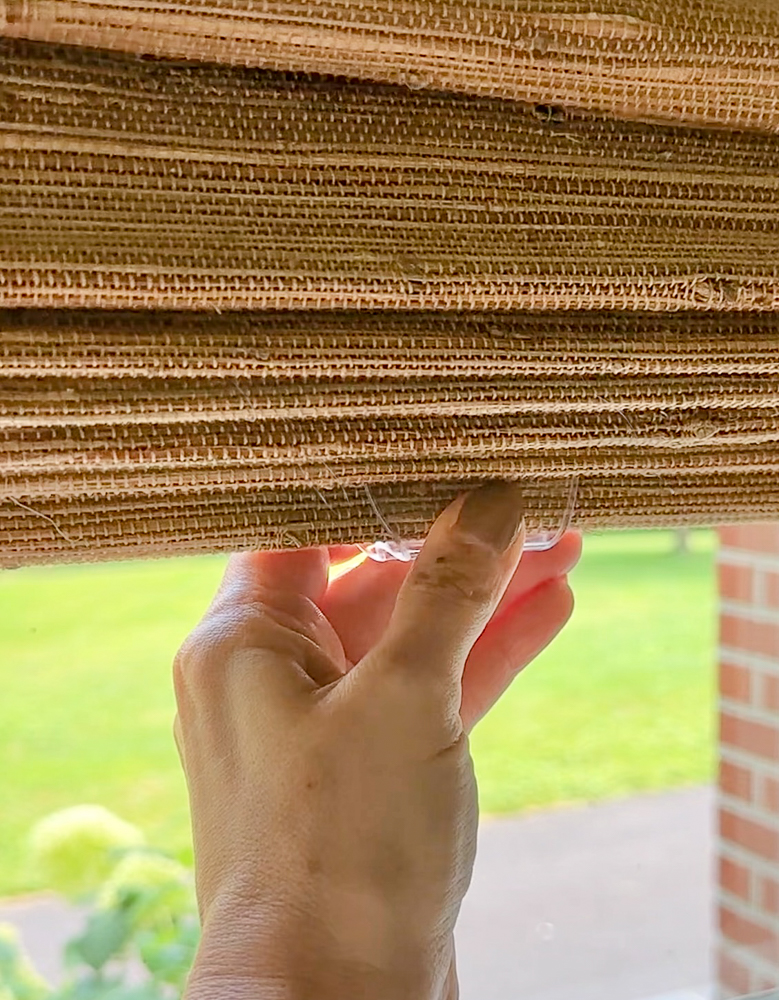 woven roman shades with plastic clip to protect material