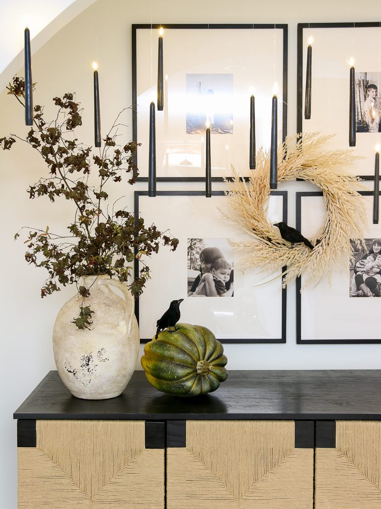 classy halloween decorating ideas including floating candles and blackbirds
