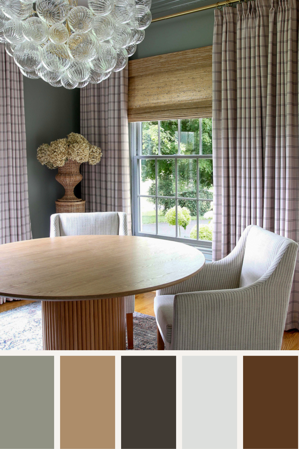 home office with fall color palette, BM storm cloud gray walls, Stefana Silber x Two Pages windowpane drapes, woven roman shade, round pedestal table in center of room with striped linen chairs, rattan pedestal and urn with dried hydrangeas