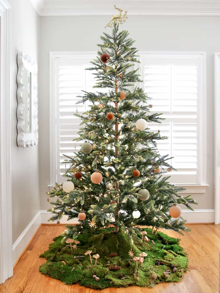 unique Christmas tree skirt alternatives, woodland tree skirt with moss, mushrooms, and pine cones 