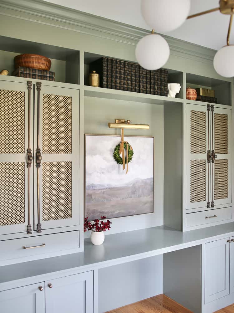 hang wreaths on wall art, home office built-in cabinets, large wall art decorated with small boxwood wreath for Christmas, Benjamin Moore Storm Cloud Gray, brass cabinet hardware