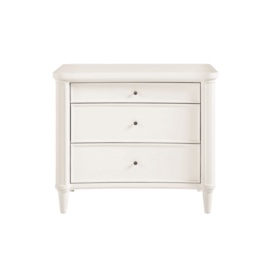cream colored three drawer nightstand