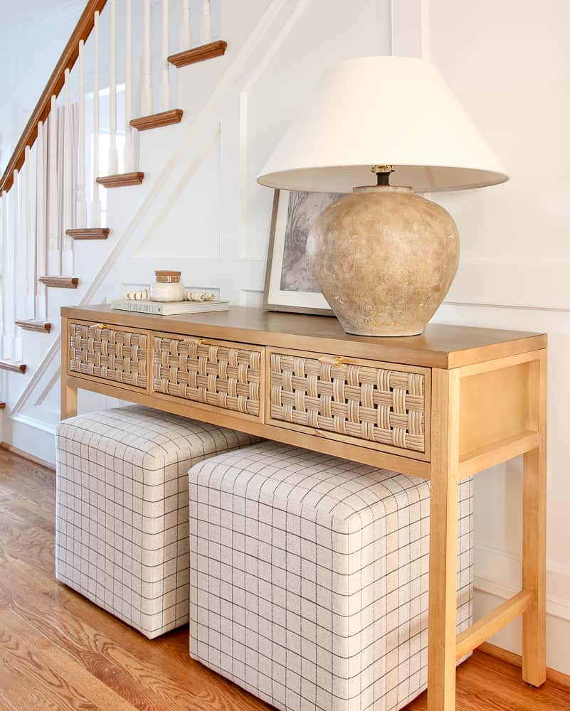 ottoman ideas for your home, two cube ottomans styled under a console table in an entryway 